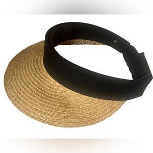 Straw visor, tan with black trim. Adjustable strap. One size.